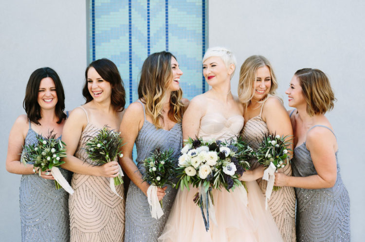 The bridesmaids were rocking matching sparkling gowns of different colors