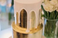 04 gold wedding cake with white chocolate drip