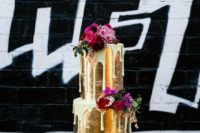 05 gold leaf drip wedding cake with bold flowers