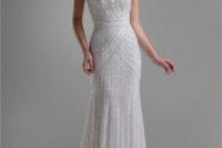 05 heavily embellished cap sleeves sheath wedding gown inspired by the 1920s