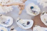 05 oyster shell escort cards can be DIYed