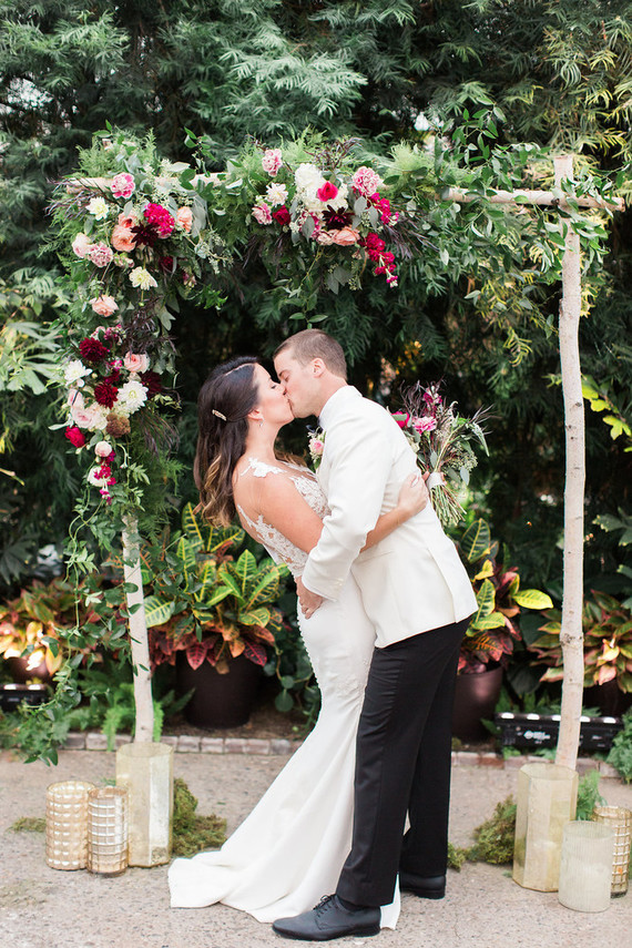 I love a lot of greenery and a rustic bold wedding arch