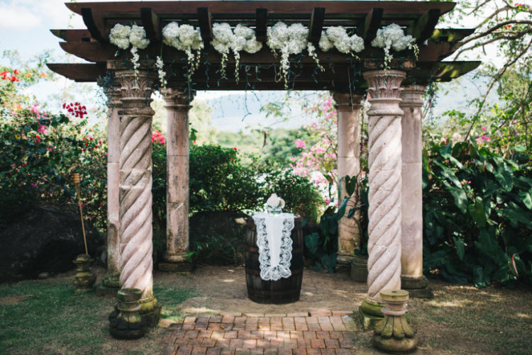 The arbor was decorated with white flowers