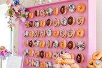 06 glam pink donut bar with hooks for comfortable display, lots of flowers