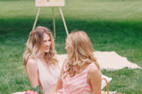 07 The bridesmaids were rocking mismatched striped dresses in cute pink tones