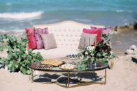 07 The lounge was decorated in blush, greys and shades of purple in front of the blue sea