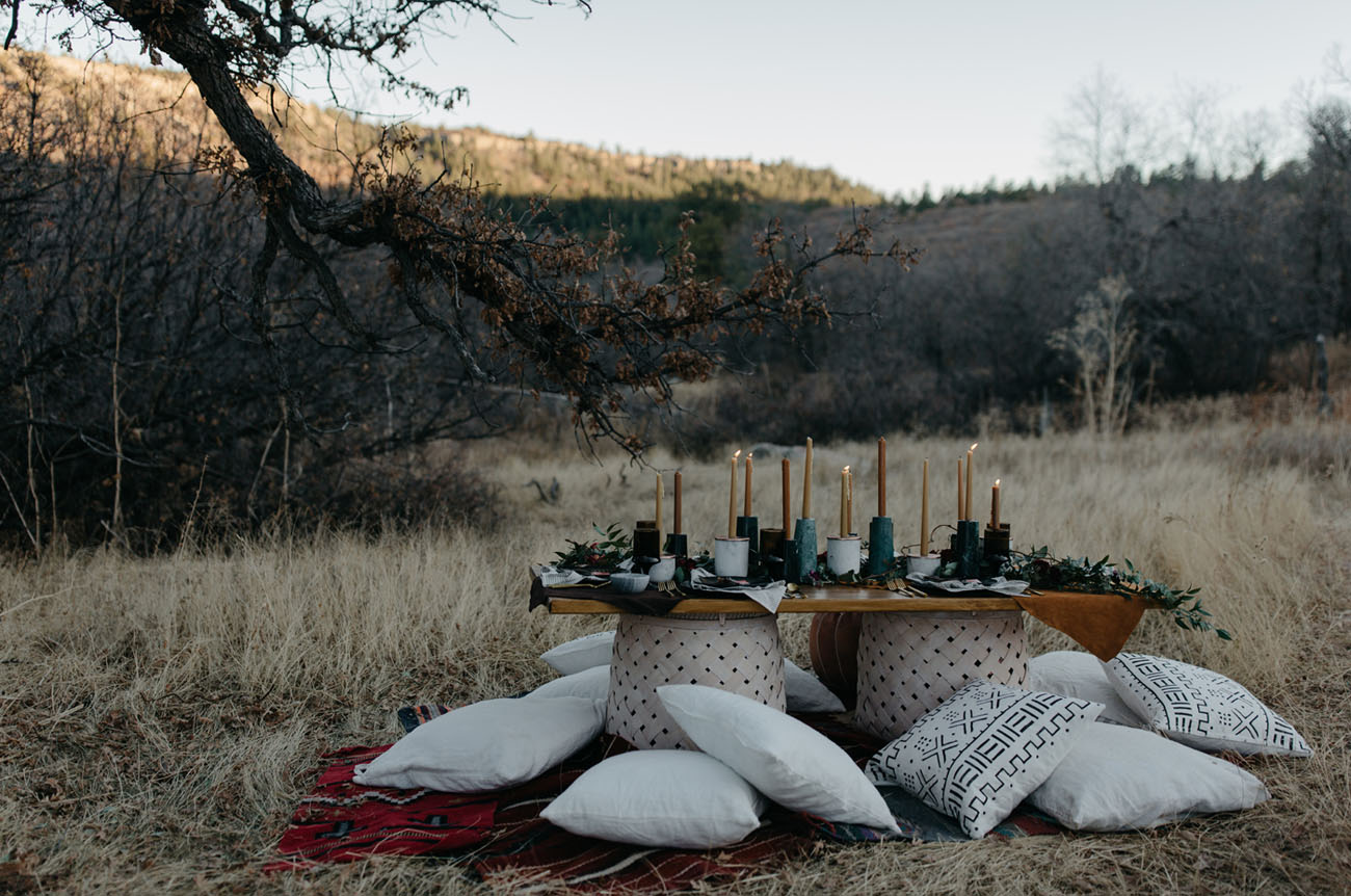 The table was set up as a picnic one but decorated in moody colors and dark shades
