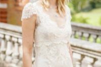 07 ivory lace wedding dress with cap sleeves and a high waist
