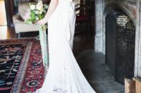 07 relaxed wedding gown with a train and a lace racerback with a bow