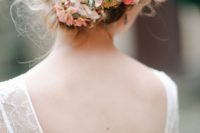 09 braided wedding updo with fresh flowers in it