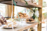 09 simple rustic donut bar decorated with flowers and greenery
