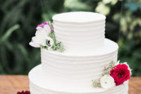 11 The wedding cake was also pretty simple, a classic white one topped with fresh flowers
