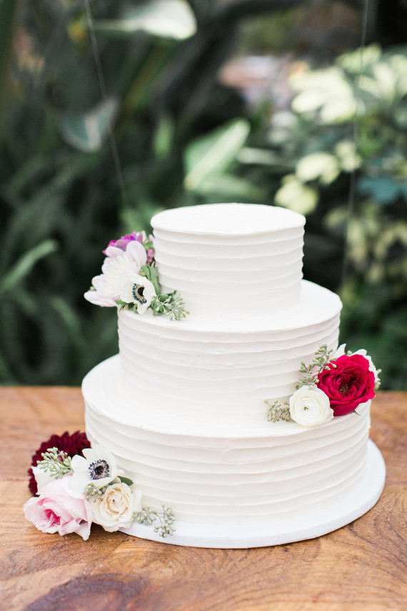 The wedding cake was also pretty simple, a classic white one topped with fresh flowers