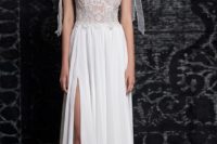 11 sleeveless lace bodice with a scoop neckline and ties, a skirt with a slit