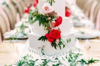 12 The wedding cake was a simple square one with bold florals for a statement