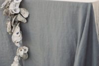 13 grey tablecloth and an oyster garland for a nautical tablescape