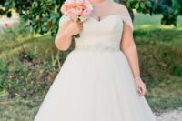 14 empire waist bridal gown with beading at the high waist and cap sleeves