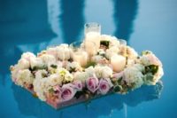 14 floating frames with lush flowers and candles