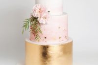 15 one tier in metallic gold, another in blush and the ttop is in white