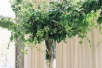 15 such lush greenery arrangements will easily turn your venue into a garden and won’t cost a lot