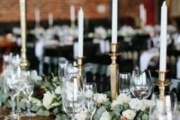 17 greenery and flower garlands on the table look awesome with gilded candle sticks