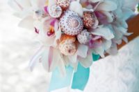 18 white orchids and shells wedding bouquet