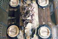 19 moody ocean-inspired wedding table decorated with real shells and sea creatures