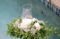 20 greenery, flowers and a candle lantern for decorating the pool