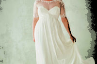 20 sheer neckline wedding dress with short sleeves and a flowy skirt