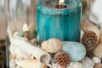 22 amazing wedding centerpiece with sand, shells and a turquoise candle