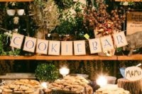 22 rustic cookie bar with a banner, greenery and candles