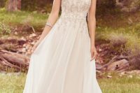 22 thin strap embellished bodice wedding dress with a flowy skirt