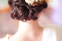 22 twisted updo with fresh flowers on the side