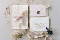 23 neutral wedding stationary in blush with gold calligraphy and blush ribbon