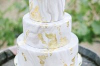 24 grey marble wedding cake with gold leaf and a peony
