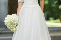 24 organza full A-line gown with illusion lace three-quarter length sleeves and scoop neckline