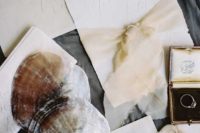25 off-white wedding stationary and shells attached