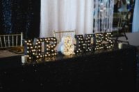 26 black and white marquee letters for decorating a sweetheart table