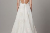 28 modern wedding gown with lace appliques and an illusion racerback