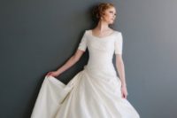 29 draped ivory wedding ballgown with short sleeves