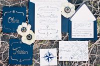 30 nautical invites in navy and white, with navy calligraphy and prints