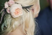 31 messy half updo with blush blooms