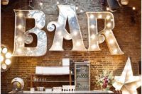 31 oversized marquee bar signand a lit up star
