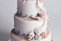 33 gorgeous seashore cake that looks very natural, with sand, shells and star fish