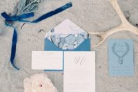 33 shades of blue and traditional sea prints are perfect for seaside wedding stationary