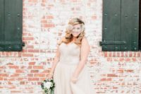 33 strapless blush wedding gown and a matching veil