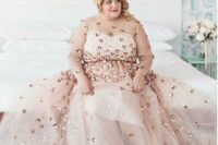 35 blush wedding dress with a sheer bodice and rose gold sequins all over