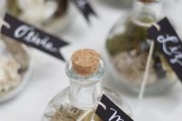 38 terrarium escort cards and favors is a creative and cool idea