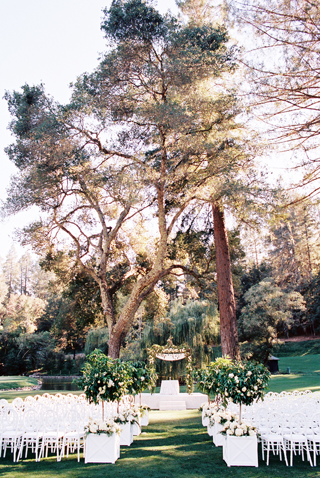 This modern all white wedding took place at a wine resort, and its decor was timeless and chic