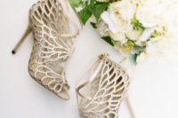 03 Glam bejeweled wedding heels of the bride and her neutral bouquet